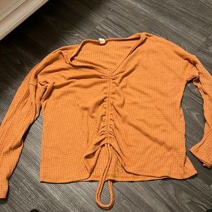 Rust long sleeve ruched top